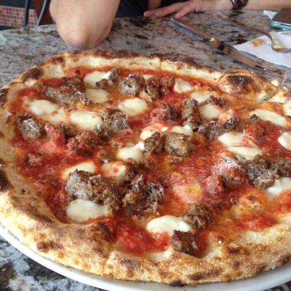 Photo taken at Varasano&#39;s Pizzeria by Lauren A. on 8/24/2014