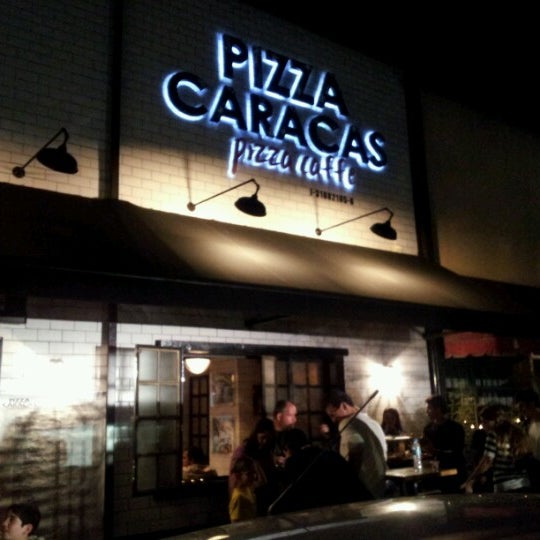 Photo taken at Pizza Caracas. Pizza-Caffe by Eduardo T. on 12/21/2012