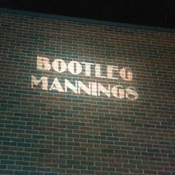 Photo taken at Bootleg Mannings by Andrew P. on 10/13/2013