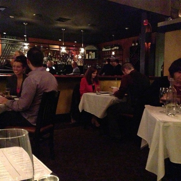 Photo taken at Bacchus Wine Bar &amp; Restaurant by Tom O. on 2/15/2013