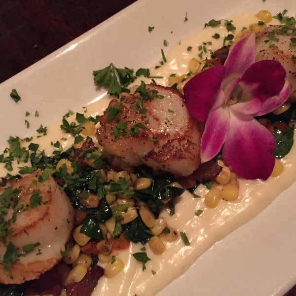 The seared scallops are excellent. A little spicy, nicely grilled.