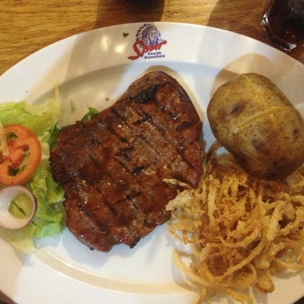 Photo taken at Spur Steak Ranches by Jacqueline F. on 8/11/2013