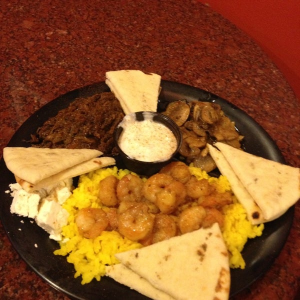 Photo taken at Poccadio Moroccan Grill &amp; Sandwiches by Lorraine B. on 1/19/2013