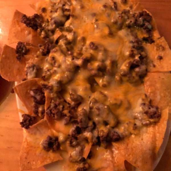 The nachos were all hyped up by food bloggers, but really they were plain and dry. It was a pile of plain cooked beef and melted cheese on chips. Tasted awful.