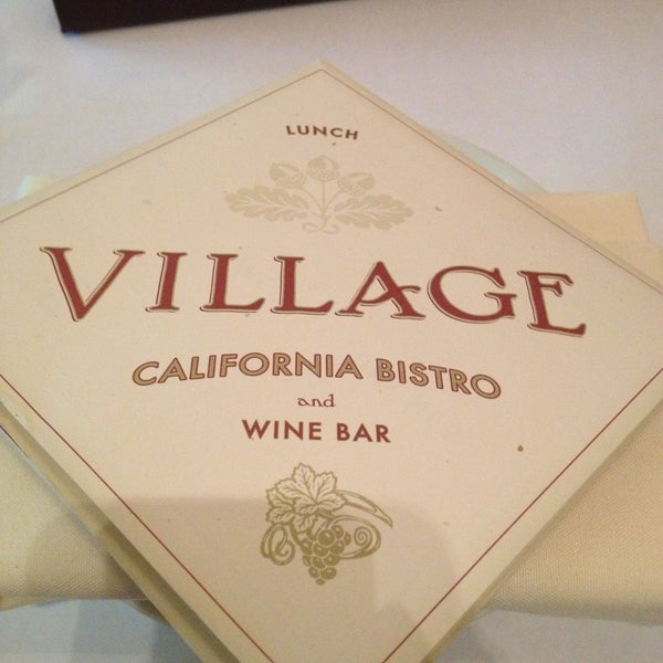 Photo taken at Village California Bistro &amp; Wine Bar by Nicole A. on 5/10/2013