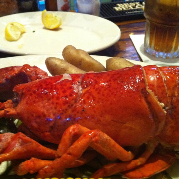 Photo taken at City Crab Shack by Leslie on 6/28/2013