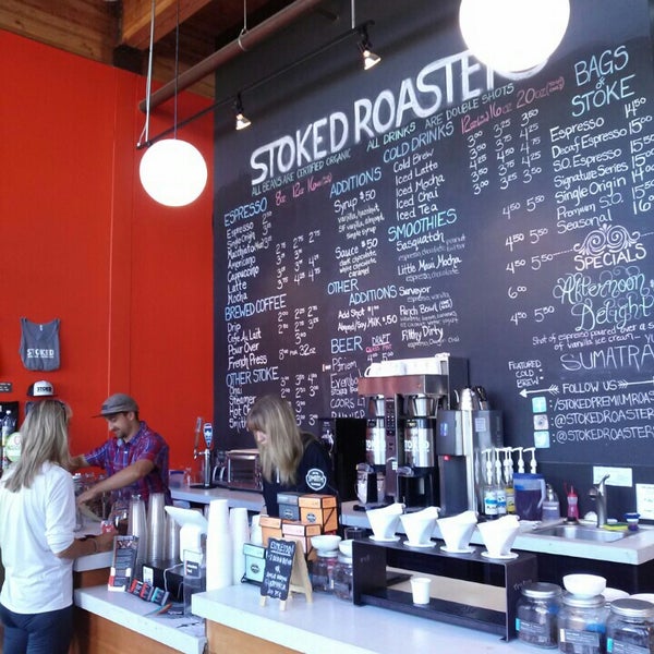 Photo taken at Stoked Roasters + Coffeehouse by gymclimber on 9/19/2015