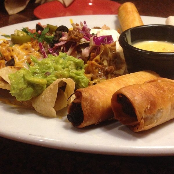 Photo taken at Tequila Grande Mexican Cafe by Vikki S. on 4/13/2014
