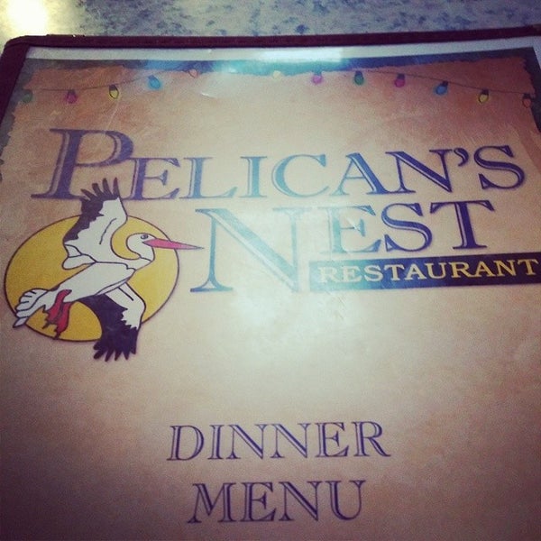 Photo taken at Pelican&#39;s Nest Restaurant by Christopher B. on 8/2/2014