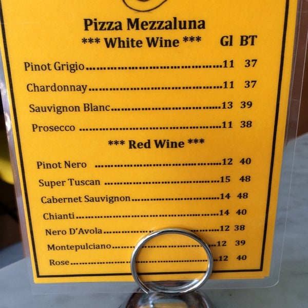 Photo taken at Pizza Mezzaluna by Coss M. on 6/29/2014