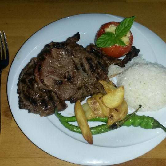Photo taken at Bingüller Steak House &amp; Mangalda Et by Onur B. on 7/13/2015