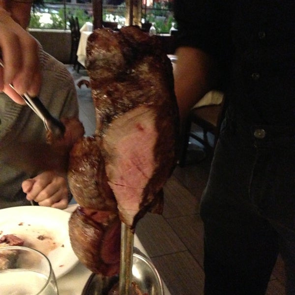 Photo taken at Libra Brazilian Steakhouse by Kenya T. on 1/7/2013