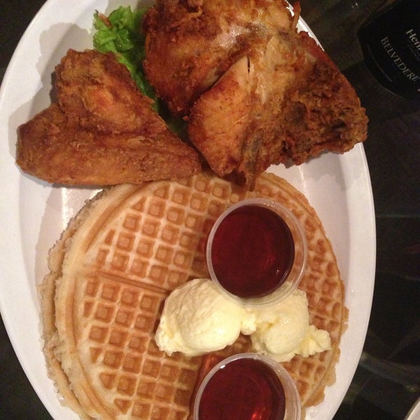 Photo taken at Home of Chicken and Waffles by James G. on 4/14/2013