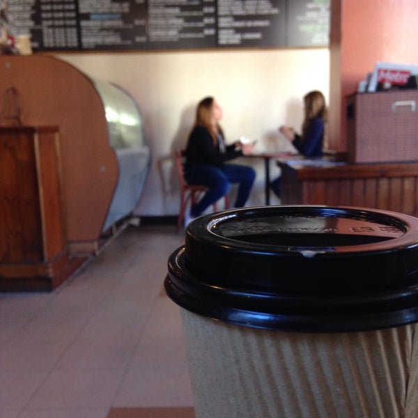 Photo taken at Coffee &amp; More by Yoshinori H. on 12/29/2014