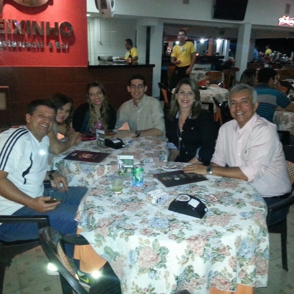 Photo taken at Peixinho Bar e Restaurante by Fabiola M. on 6/8/2014