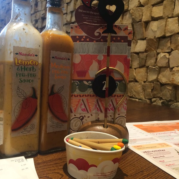 Photo taken at Nando&#39;s by Marwah N. on 10/3/2015