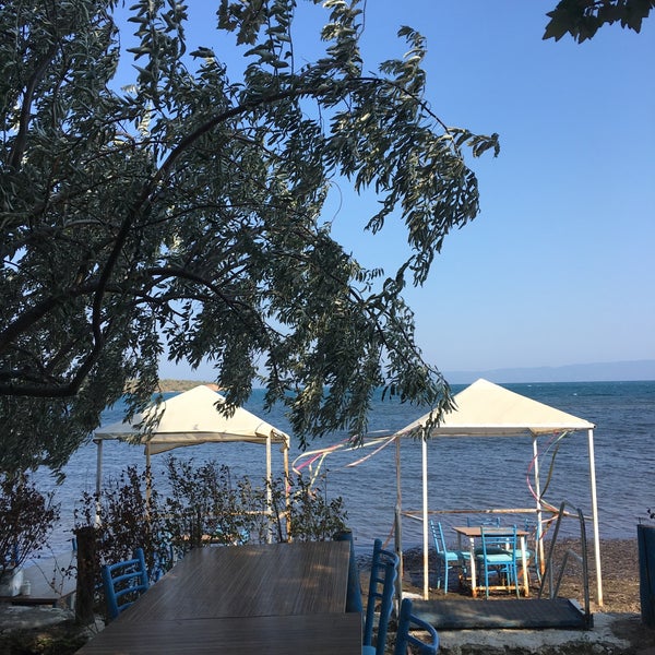 Photo taken at Delicia Restaurant &amp; Beach by Betül Y. on 8/10/2017