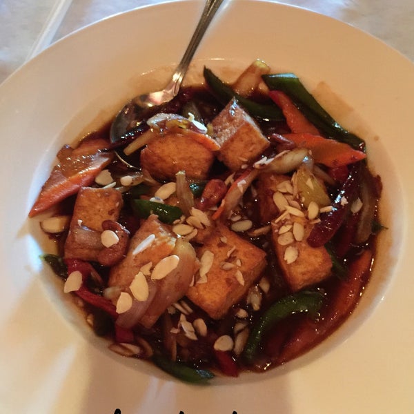The Almond and Cashew Tofu (listed in the vegetarian section on the menu) can be made vegan and is DELICIOUS. It's seriously one of our favorite dishes in this entire city.