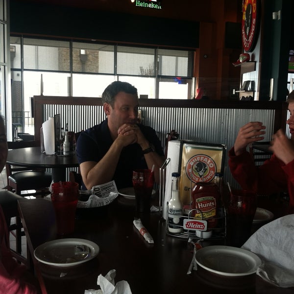 Photo taken at Wings &amp; Rings by Stephanie M. on 4/28/2013