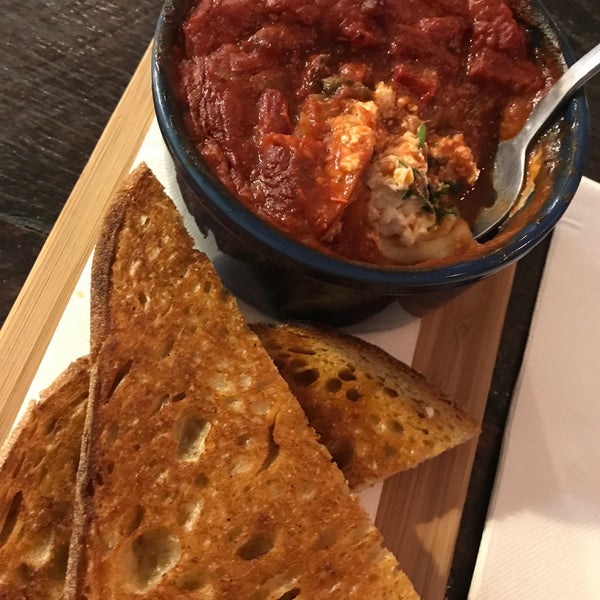 Try the Spanish baked eggs! Also, the banana bread here is an absolute delight!