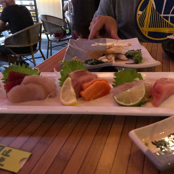 Photo taken at Doraku Sushi by Katherine L. on 5/21/2019
