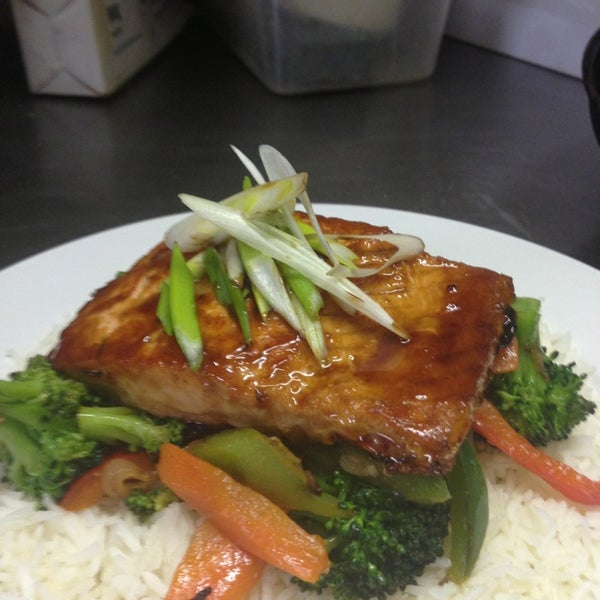 Today's special: Teriyaki glazed salmon on a bed of basmati rice and garlic sautéed veggies. $12.45