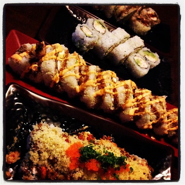 Photo taken at Sushi Delight by Caselyn L. on 11/28/2012