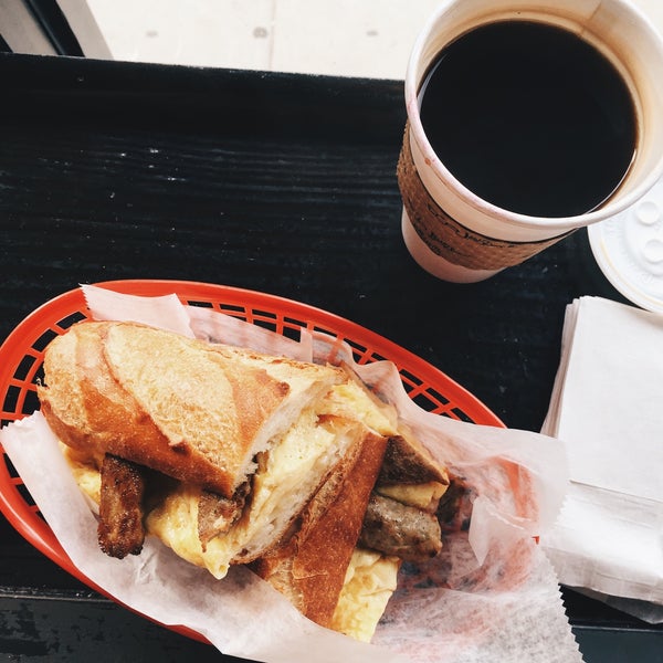 Amazing sausage, egg, and cheese on a baguette that comes with a tangy hot sauce on the side served till 4pm. Coffee is also on point. Great atmosphere.