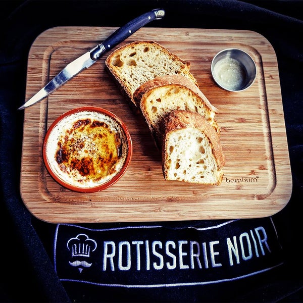 Photo taken at Rotisserie Noir by Rotisserie Noir on 2/24/2014
