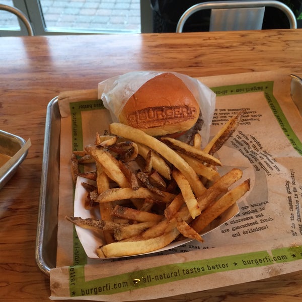 Photo taken at BurgerFi by Terrence S. on 3/27/2015