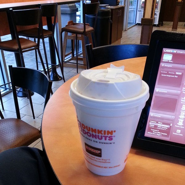 Photo taken at Dunkin&#39; by J M. on 10/3/2014