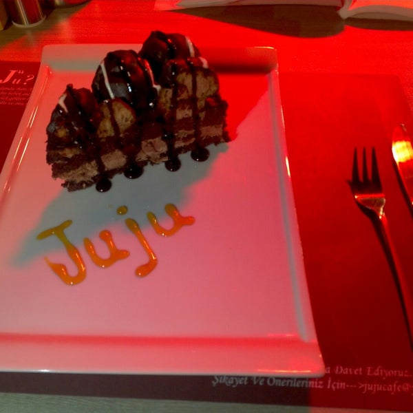 Photo taken at Juju Cafe by Tolga A. on 12/16/2014