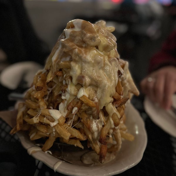 In addition to fried chicken, you should try their huge Poutine too!