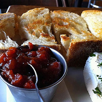 Try the craveworthy plate of darkly toasted Labriola bread, with spreadable farmers cheese, itself smoked in-house for two days using hickory chips. Top this with a bright, sweet house-made tomato jam