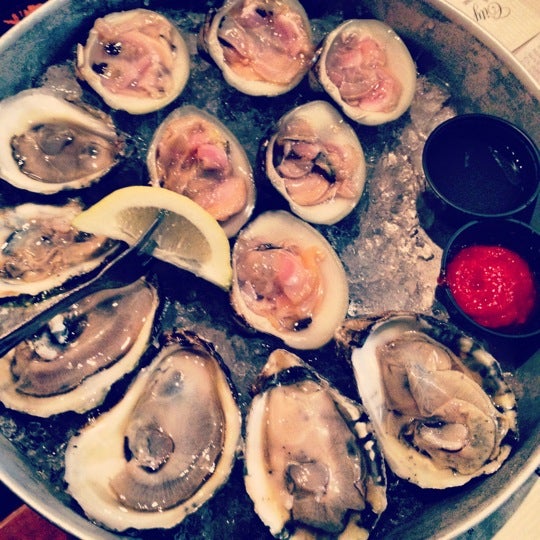 Photo taken at Doc Magrogan&#39;s Oyster House by Anastasia G. on 8/4/2012