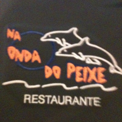 Photo taken at Na Onda do Peixe by Marcio Issao W. on 8/2/2012