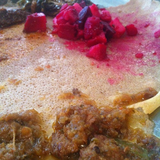 Photo taken at Bati Ethiopian Restaurant by Liz on 7/5/2012
