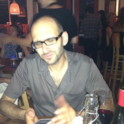 Photo taken at Mercato Osteria Enoteca by Laurel T. on 8/4/2012