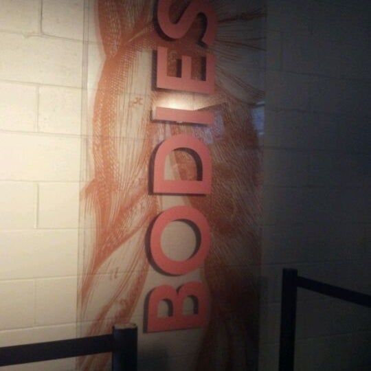 Photo taken at BODIES...The Exhibition by Jessie R. on 4/4/2012