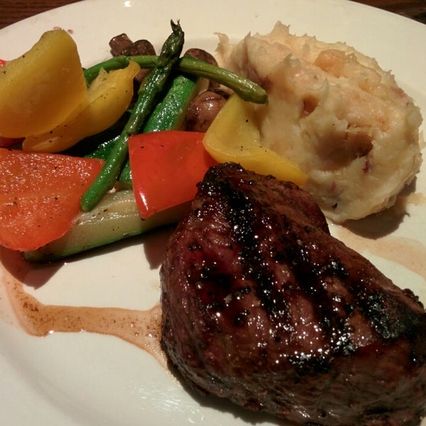 Photo taken at The Keg Steakhouse + Bar - Maple Ridge by Samuel O. on 7/4/2014