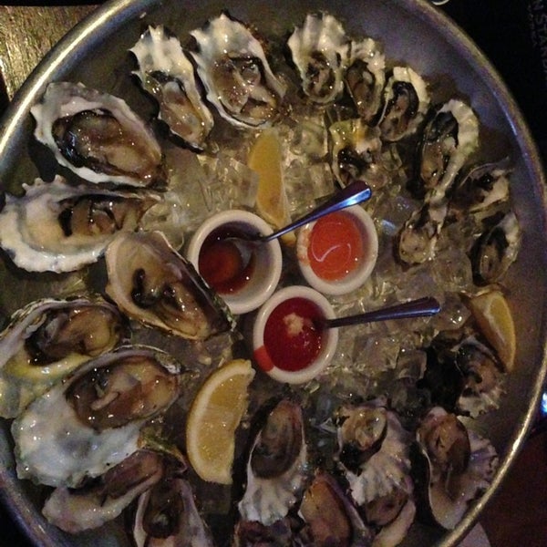 Photo taken at Mayes Oyster House by Diana H. on 3/10/2013