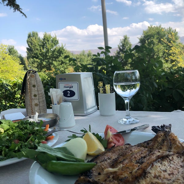 Photo taken at Mavi Göl Restaurant by Esra T. on 8/22/2019