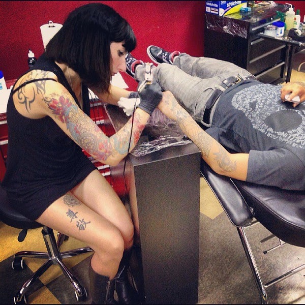 Photo taken at The Experience Ink Tattoo and Smoke Shop by Vin A. on 5/16/2013