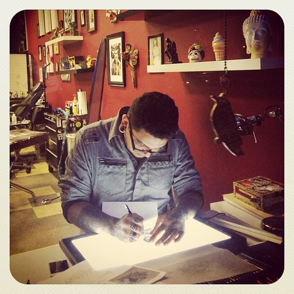 Photo taken at The Experience Ink Tattoo and Smoke Shop by Vin A. on 3/1/2013