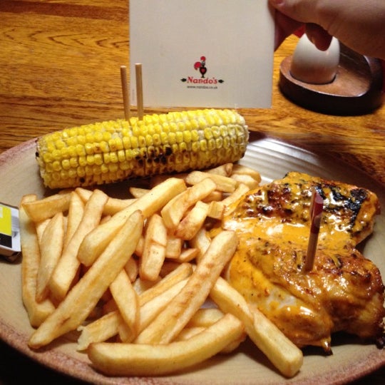 Photo taken at Nando&#39;s by Erkan S. on 10/13/2012