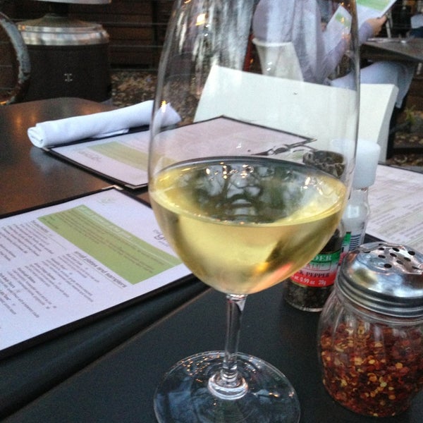 Photo taken at The Grove Wine Bar &amp; Kitchen - West Lake by Katie O. on 3/19/2013