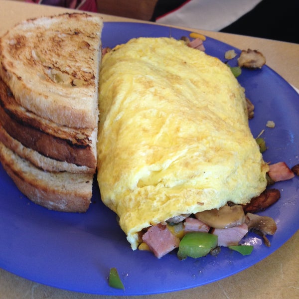 Photo taken at The Omelette Shoppe by Katie C. on 12/23/2014