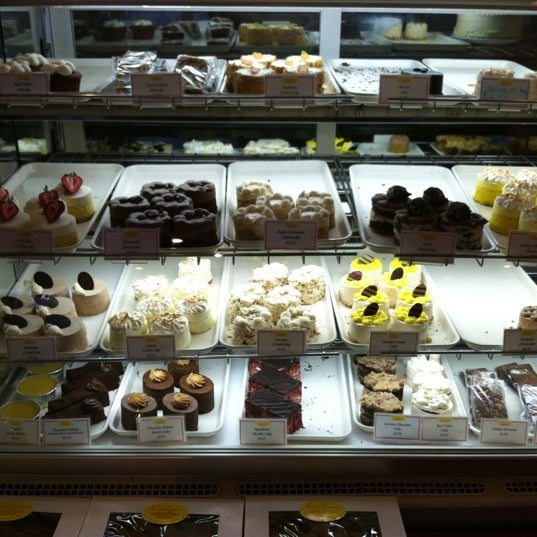 Photo taken at Indulgence Pastry Shop &amp; Cafe by Erin S. on 10/6/2012