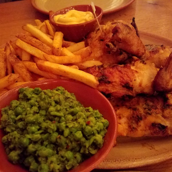 Photo taken at Nando&#39;s by Ami H. on 8/27/2018