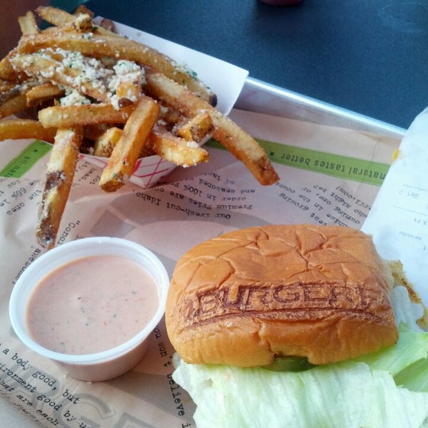 Photo taken at BurgerFi by Hunter T. on 7/24/2014